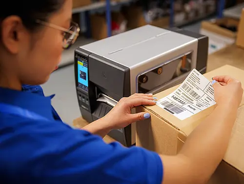 retail-photography-application-back-of-store-zt231-label-applying-500w.webp